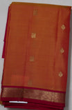 Orange Kanjivaram Saree with  Pink and Golden Zari Border