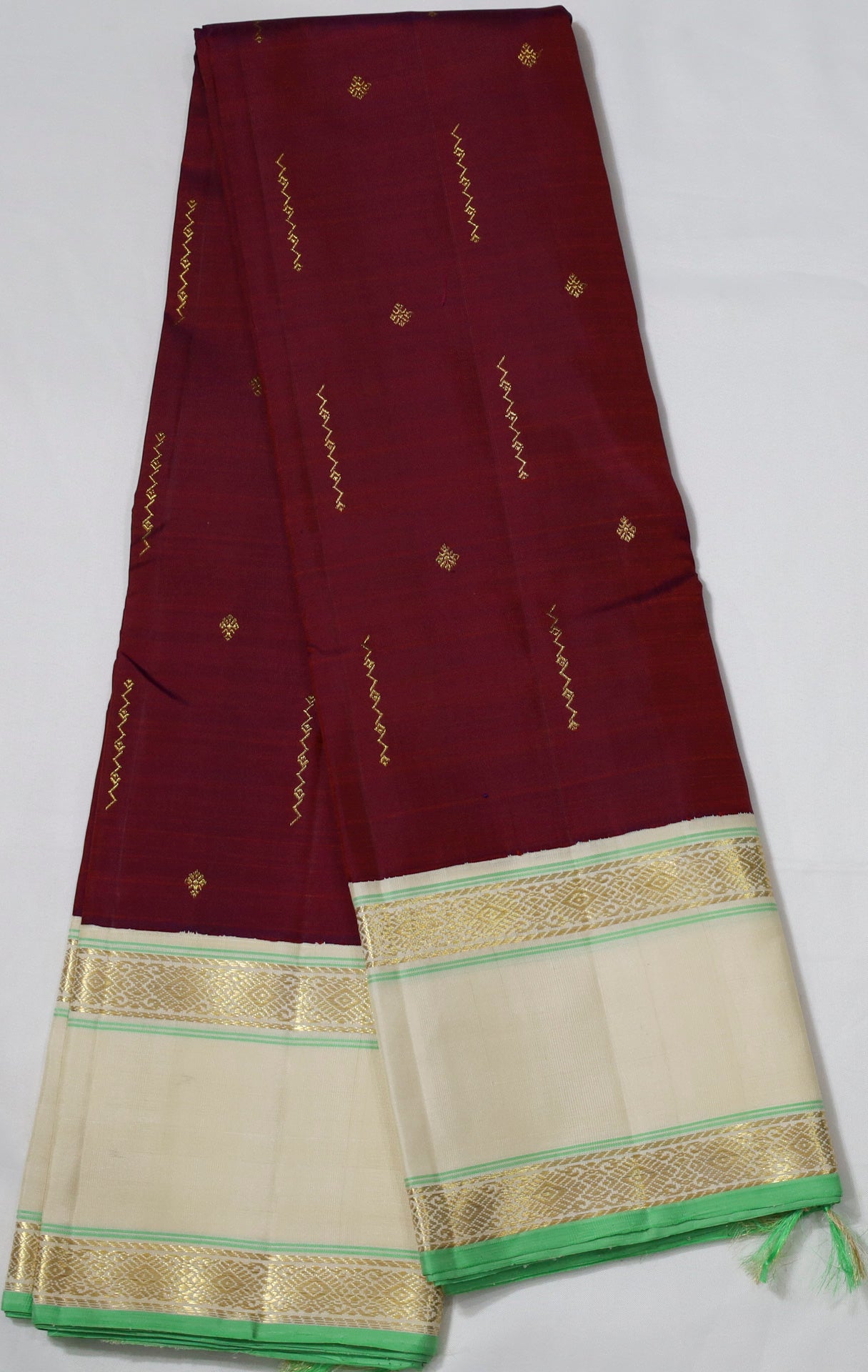 Maroon Kanjivaram Saree with Beige and Gold Border