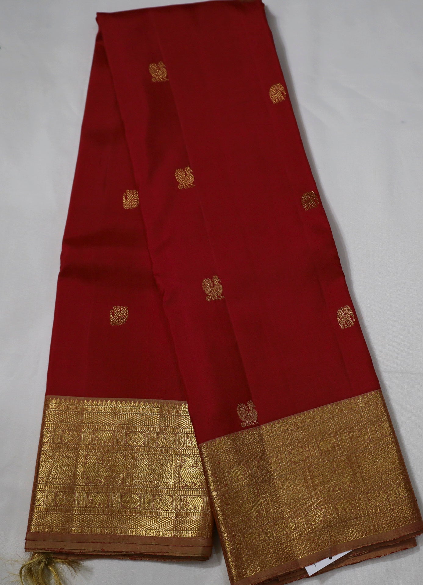 Red Kanjivaram Saree with  golden Zari Border