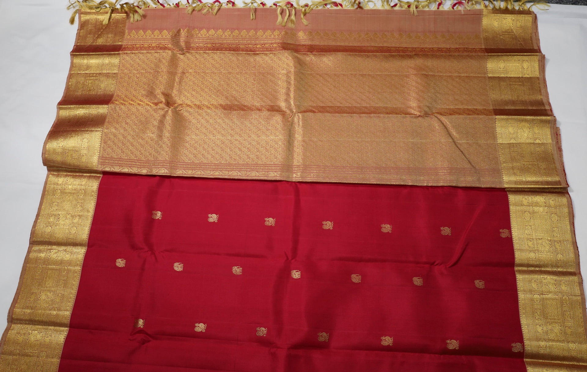 Red Kanjivaram Saree with  golden Zari Border