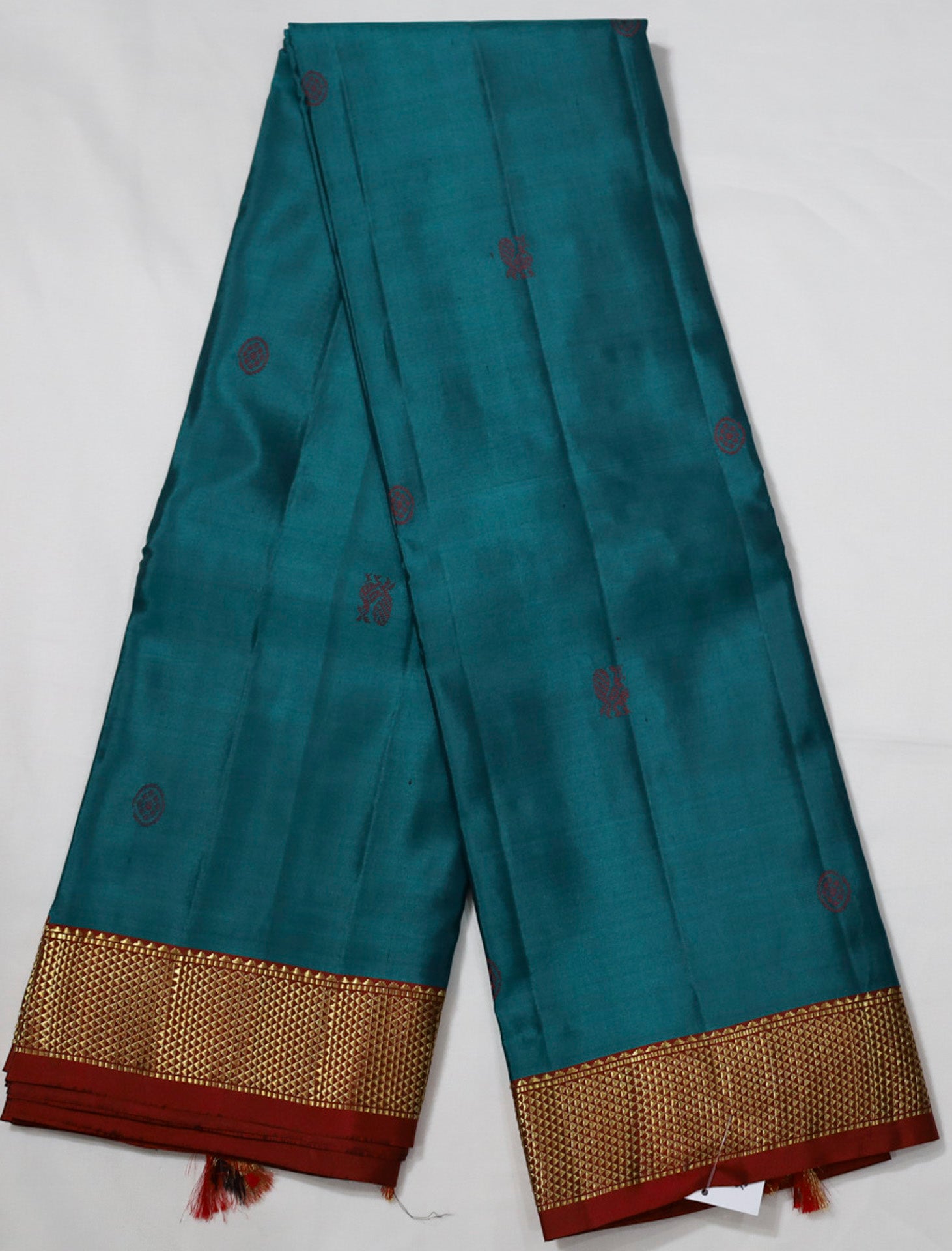 Peacock Green Kanjivaram Saree with Red and golden Zari Border