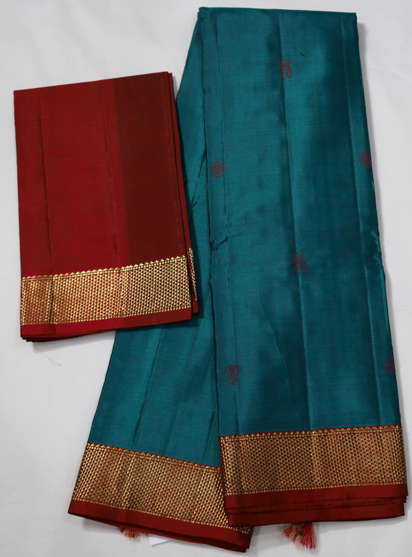 Peacock Green Kanjivaram Saree with Red and golden Zari Border