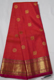 Orange Kanjivaram Saree with  Pink and golden Zari Border