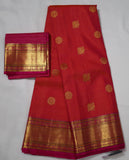 Orange Kanjivaram Saree with  Pink and golden Zari Border