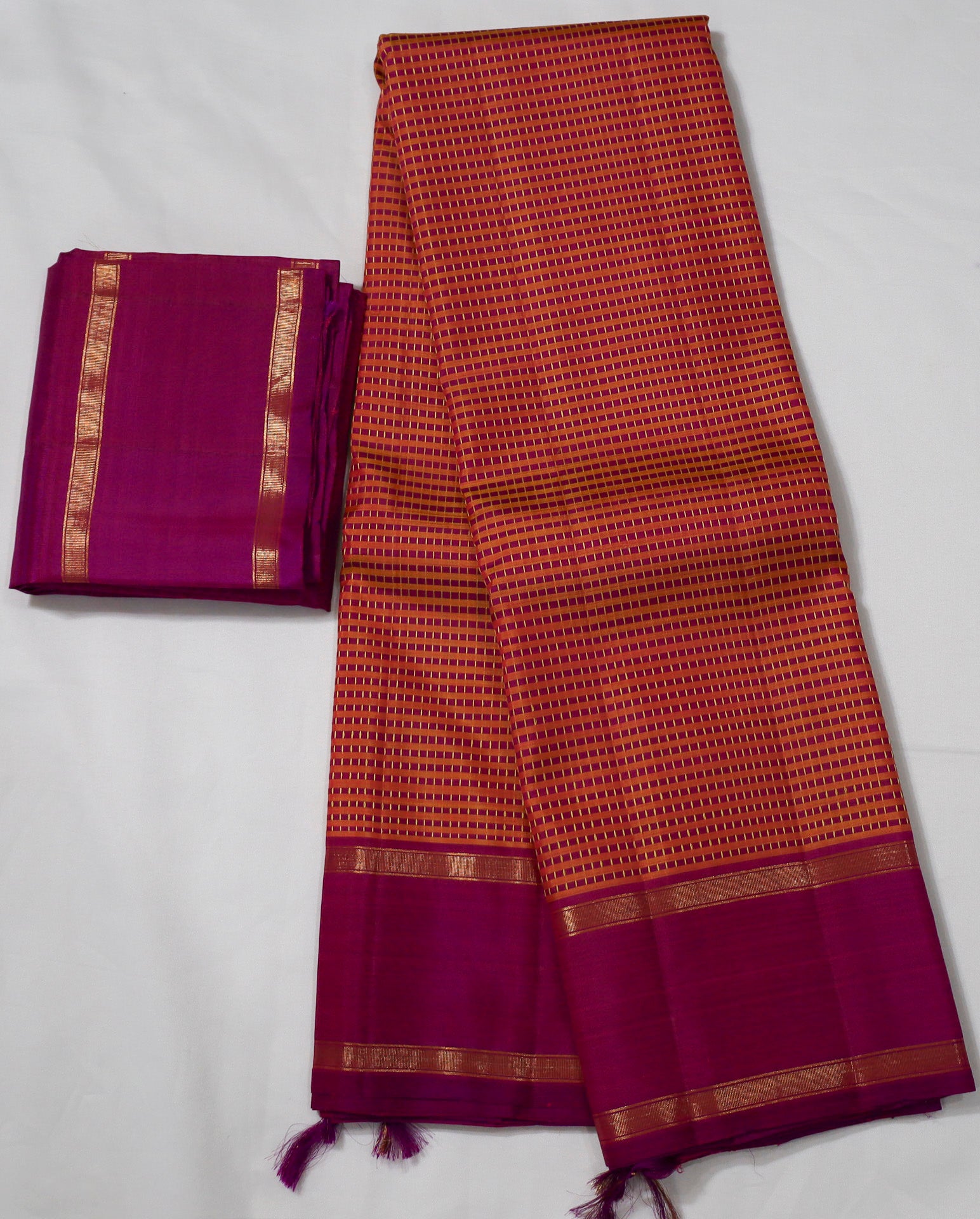 Orange Kanjivaram Saree with Pink Border