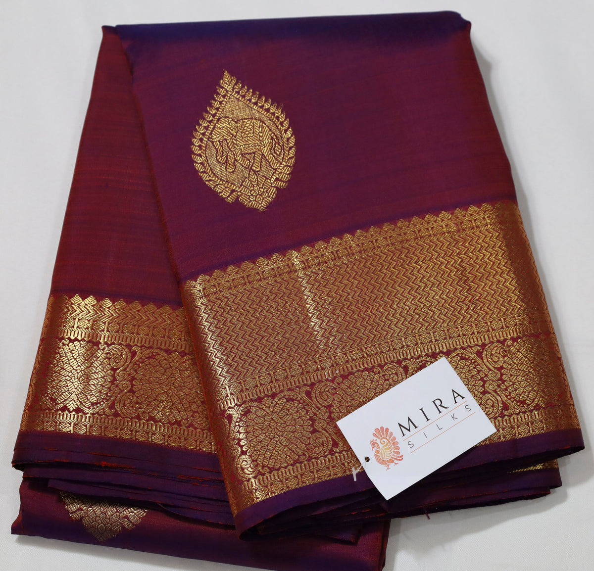 Wine Kanjivaram Saree with  golden Zari Border