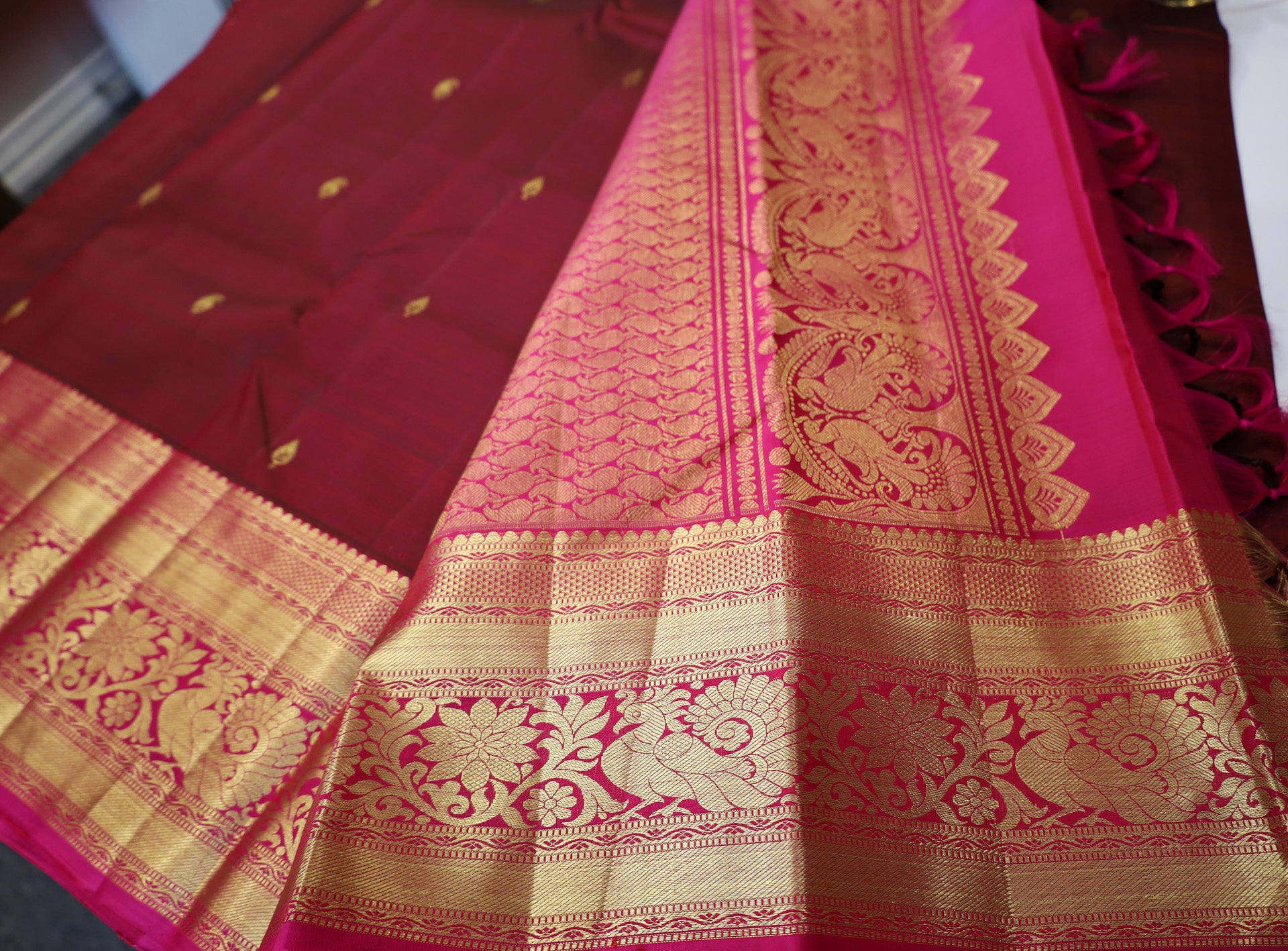 Maroon Kanjivaram Saree with Pink and  Golden Zari Border