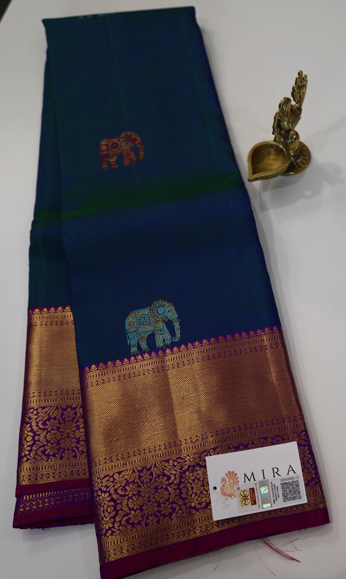 Peacock Blue Kanjivaram Saree with Purple and Golden Zari Border