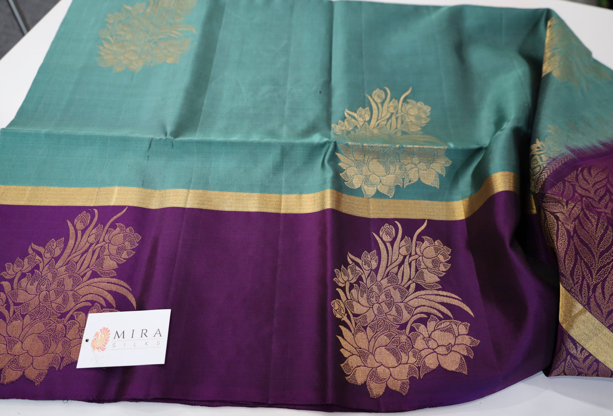 Turquoise blue color Soft Silk Saree with purple border