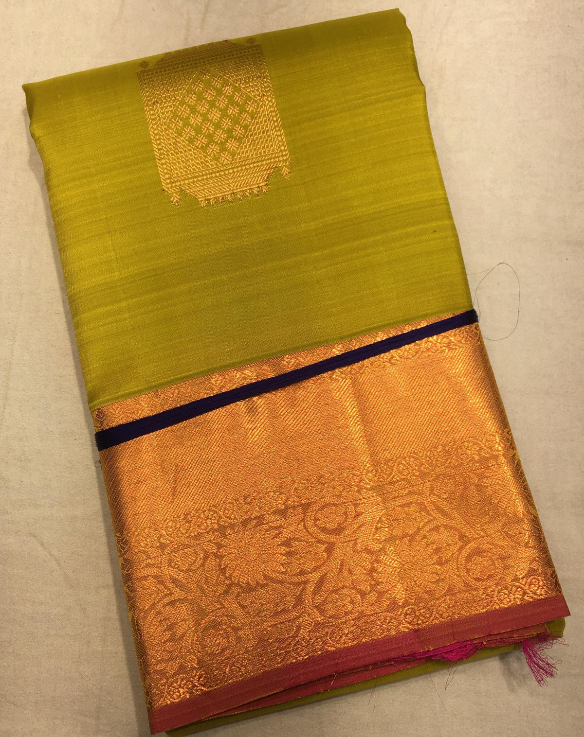 Mango Green Kanjivaram Saree with peach Border