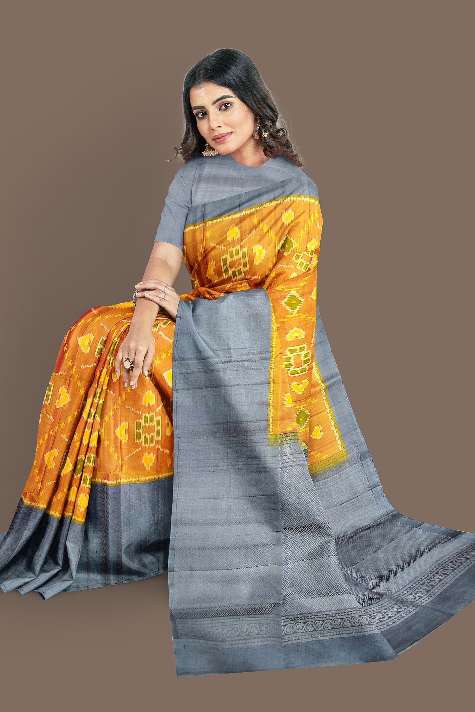 Mustard yellow with gray brocade patola soft silk saree