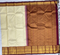 Off White Kanjivaram Saree with Maroon Border