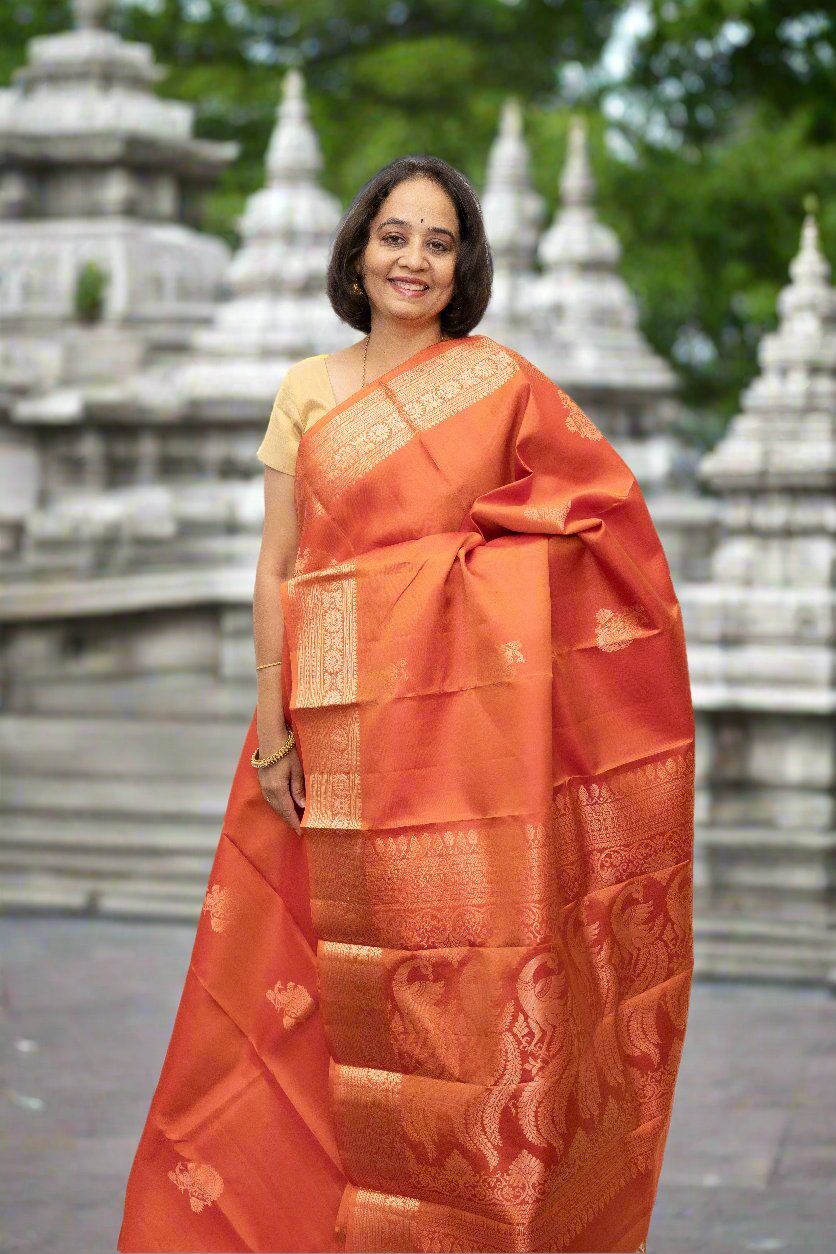 Orange Red copper zari Kanjivaram sari