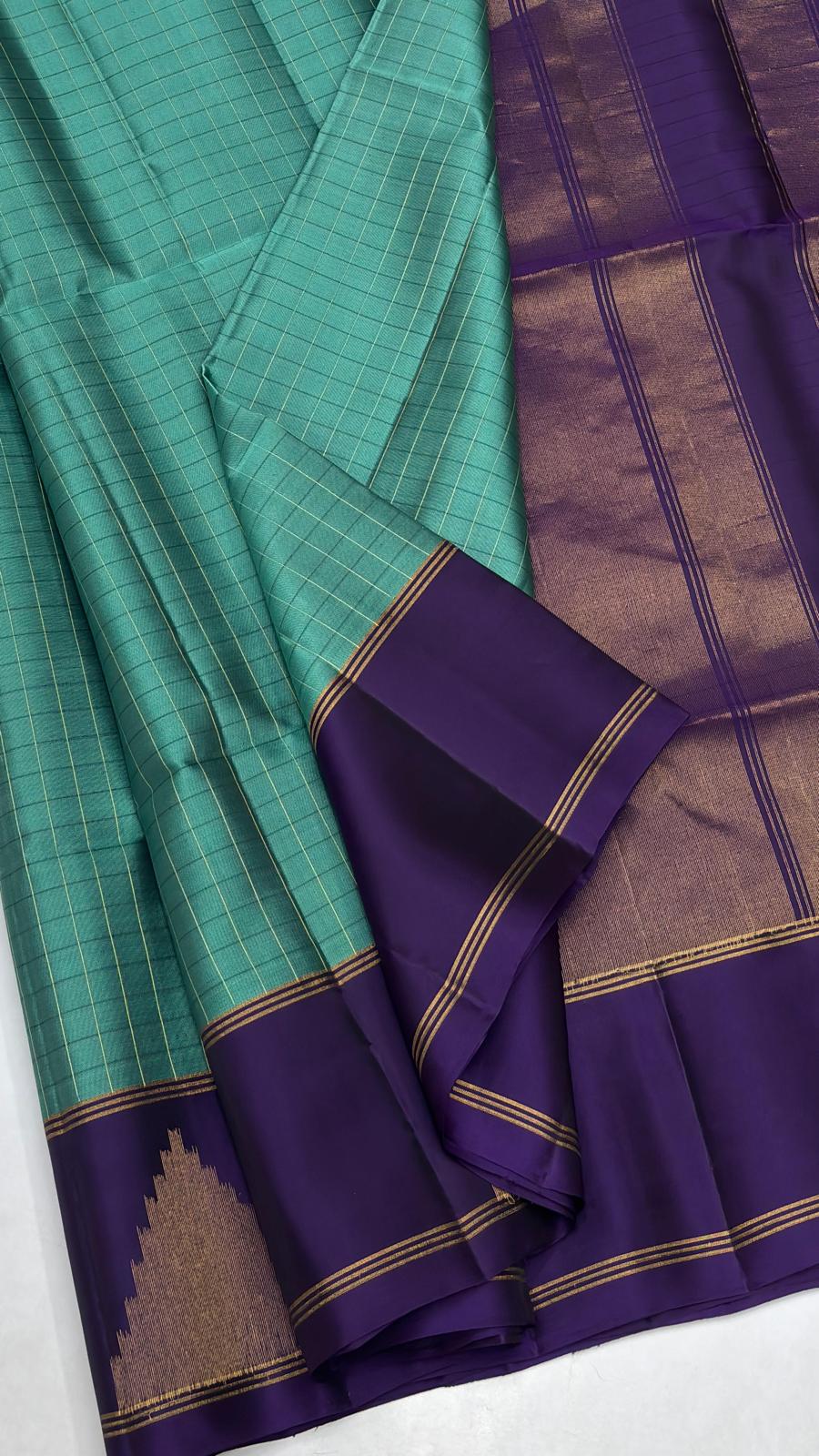 Sea green Soft Silk Saree with checks with purple pallu