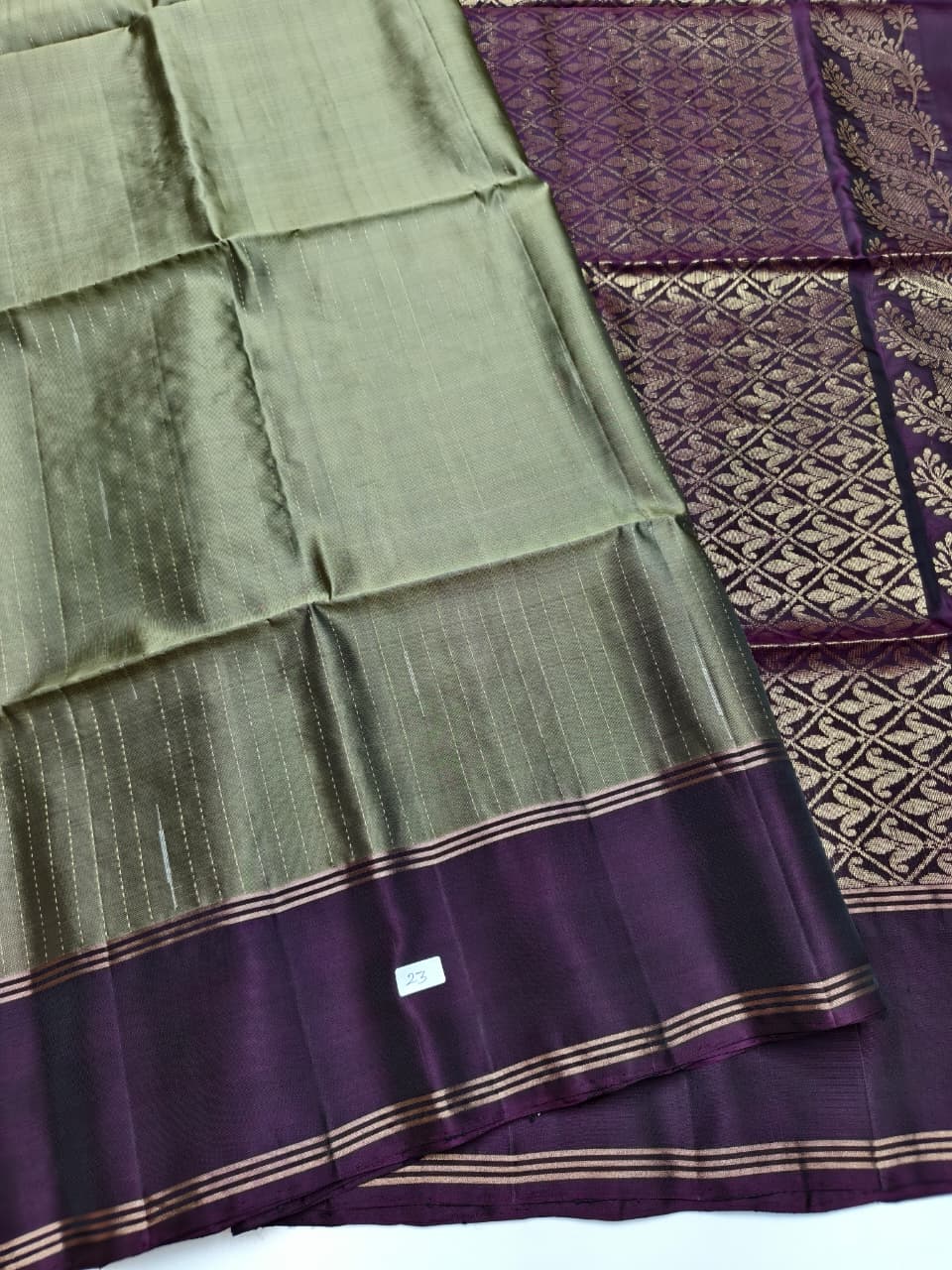 Olive green color Soft Silk Saree with purple border & pallu