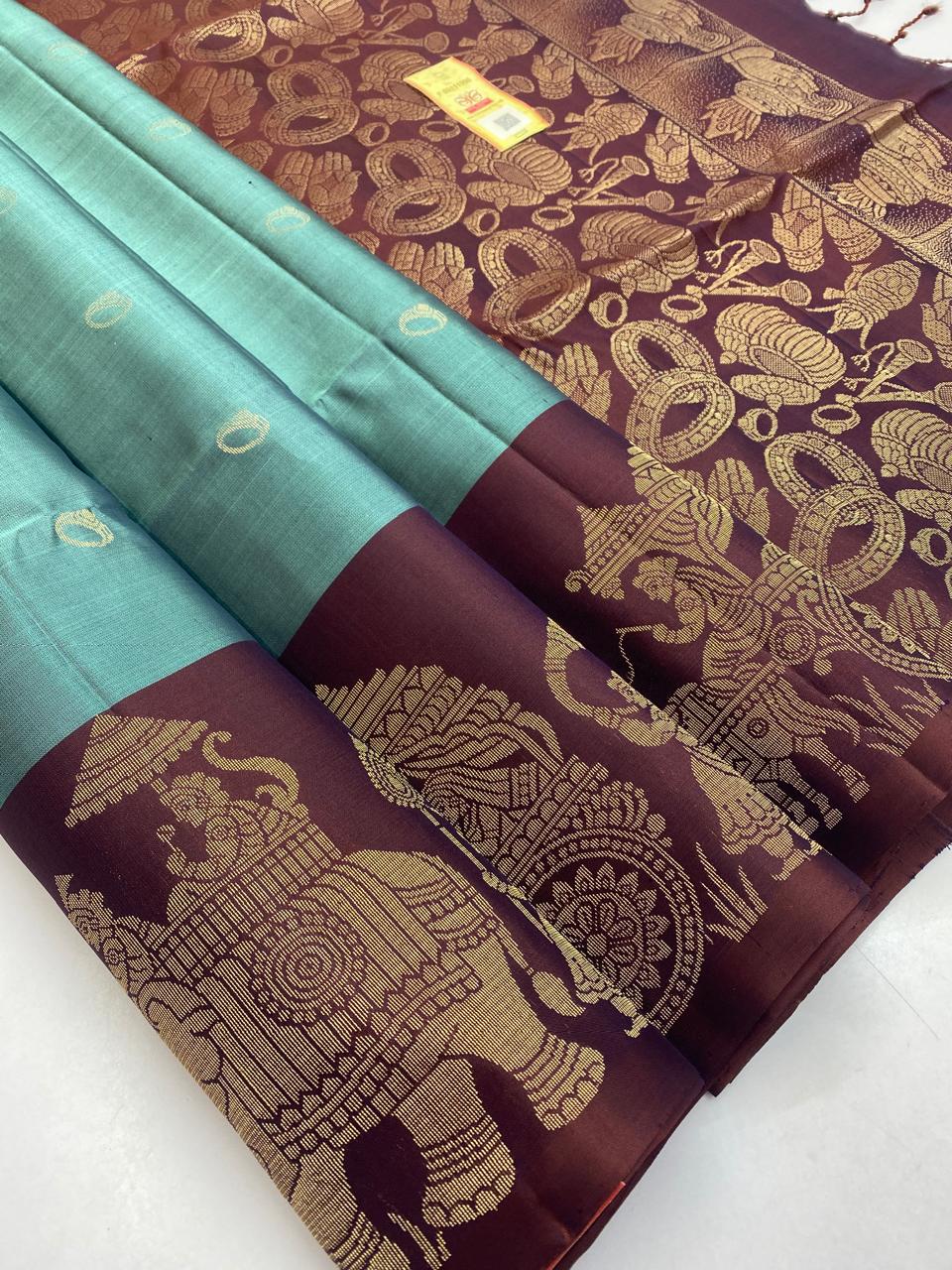 Pale Teal Soft Silk Saree with Zari Royal Procession Border