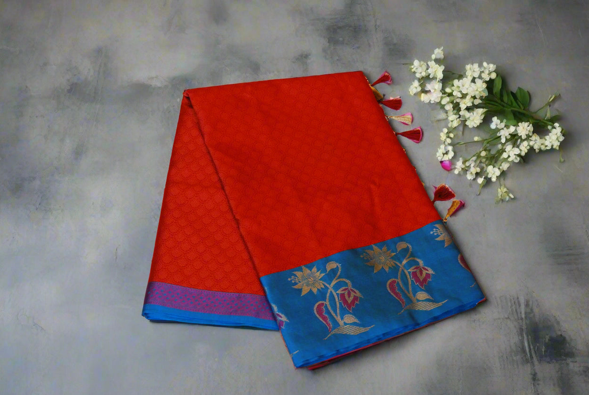 Rust Orange Banarasi Semi Silk Saree with Midnight Blue Border