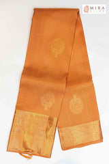 Sandy brown with copper zari kanjivaram sari
