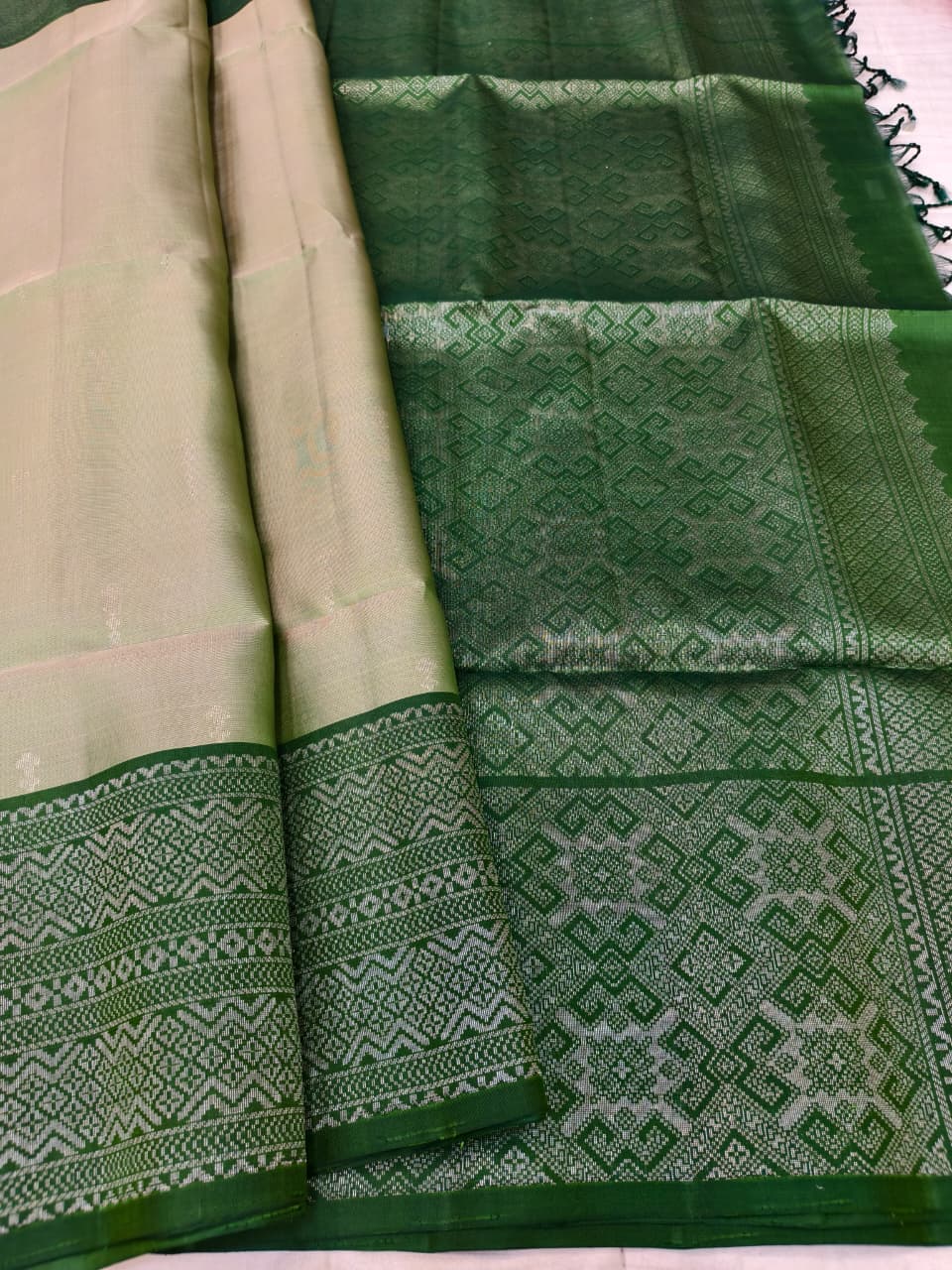 Soft Amber Soft Silk Saree with Jungle Green Pallu and Border