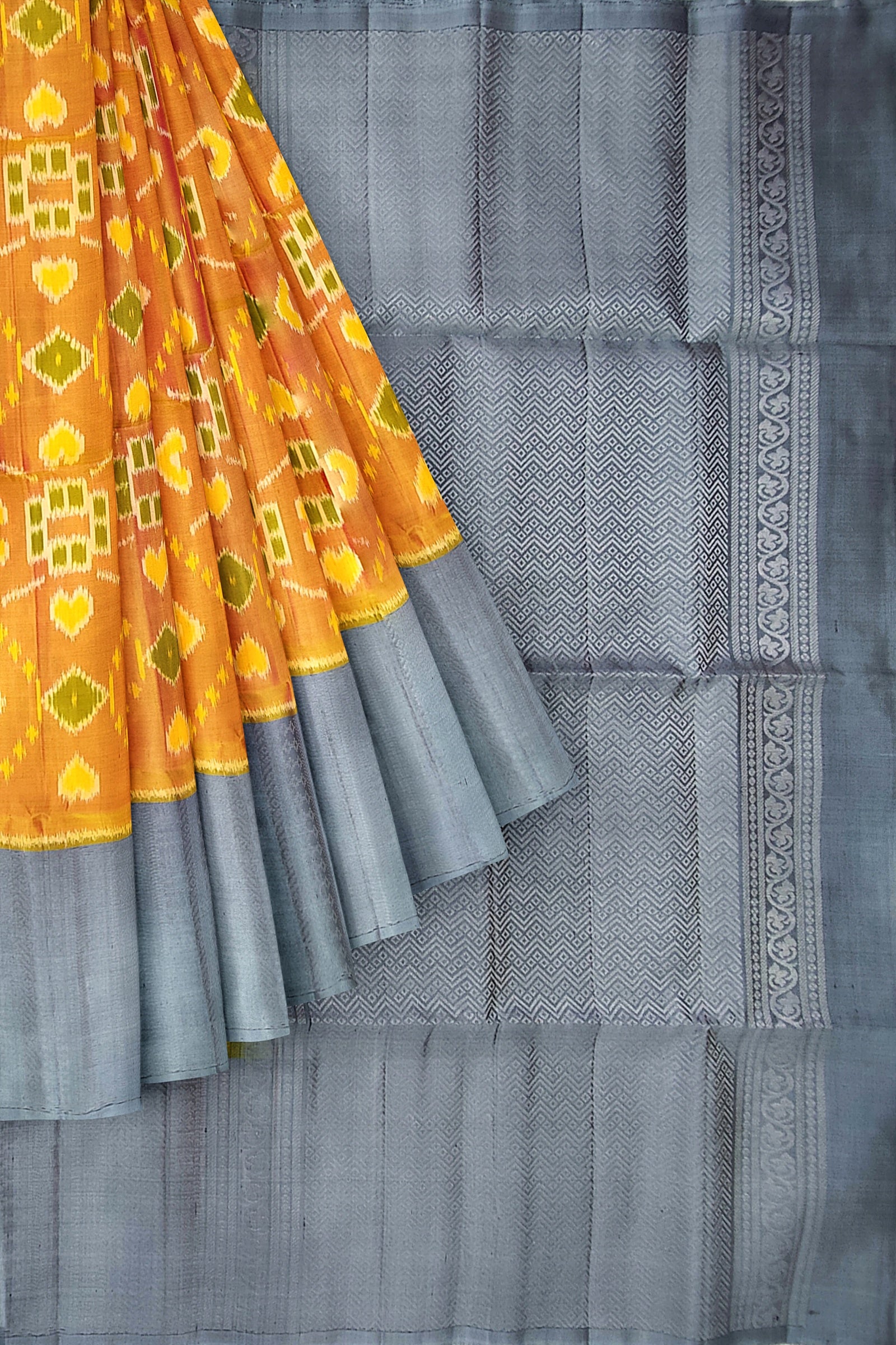 Mustard yellow with gray brocade patola soft silk saree