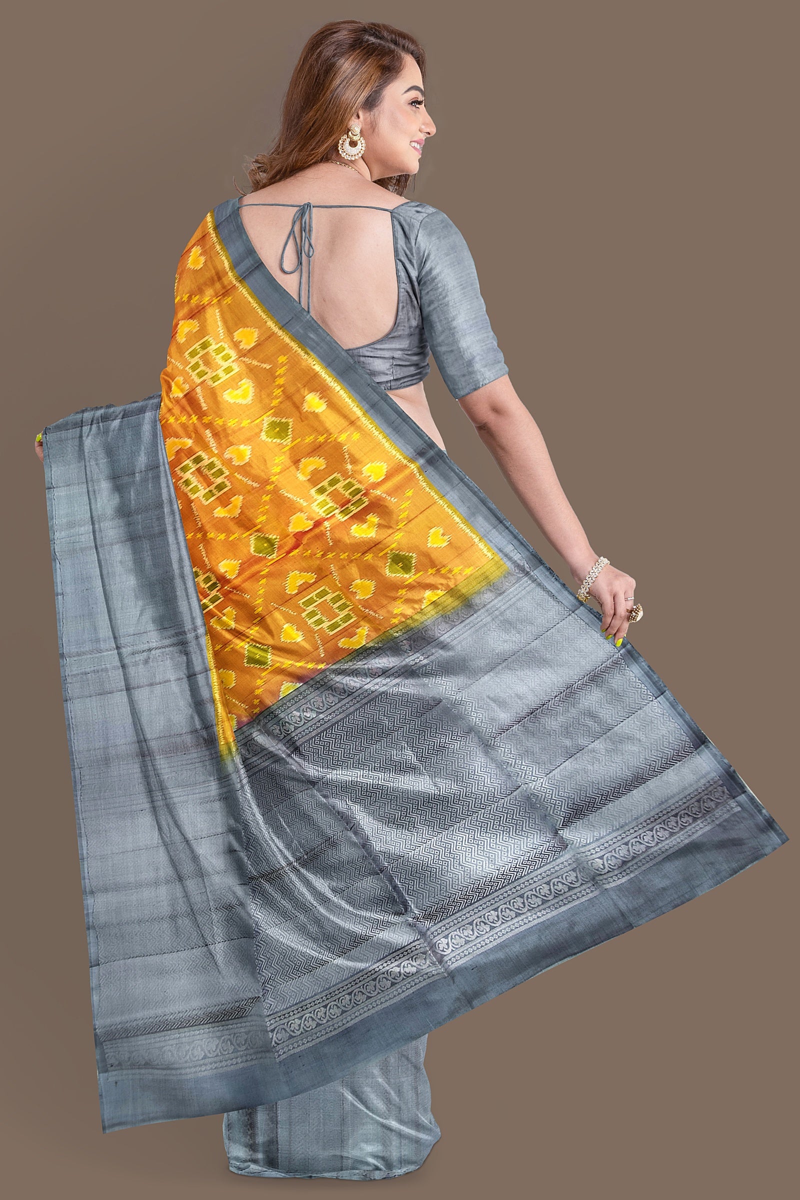 Mustard yellow with gray brocade patola soft silk saree