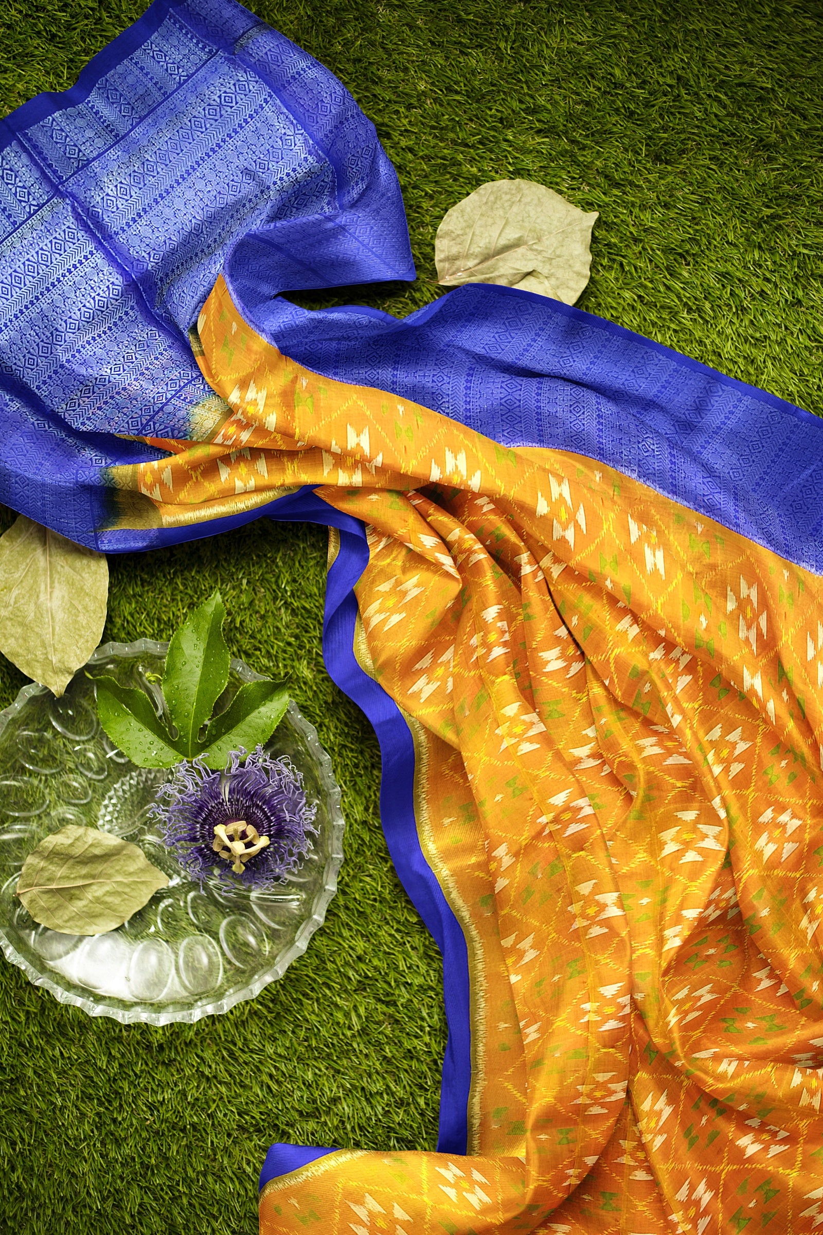 Pumpkin orange with royal blue brocade patola soft silk saree