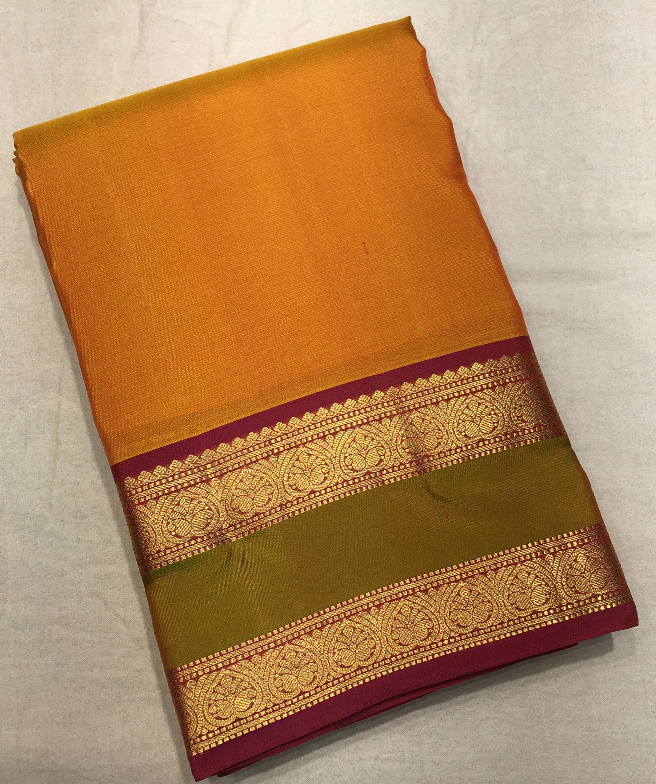 Turmeric Yellow Kanjivaram Saree with Olive Green & Maroon Border