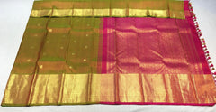 Dual tone Mehendi green Kanjivaram Saree With contrast pink pallu