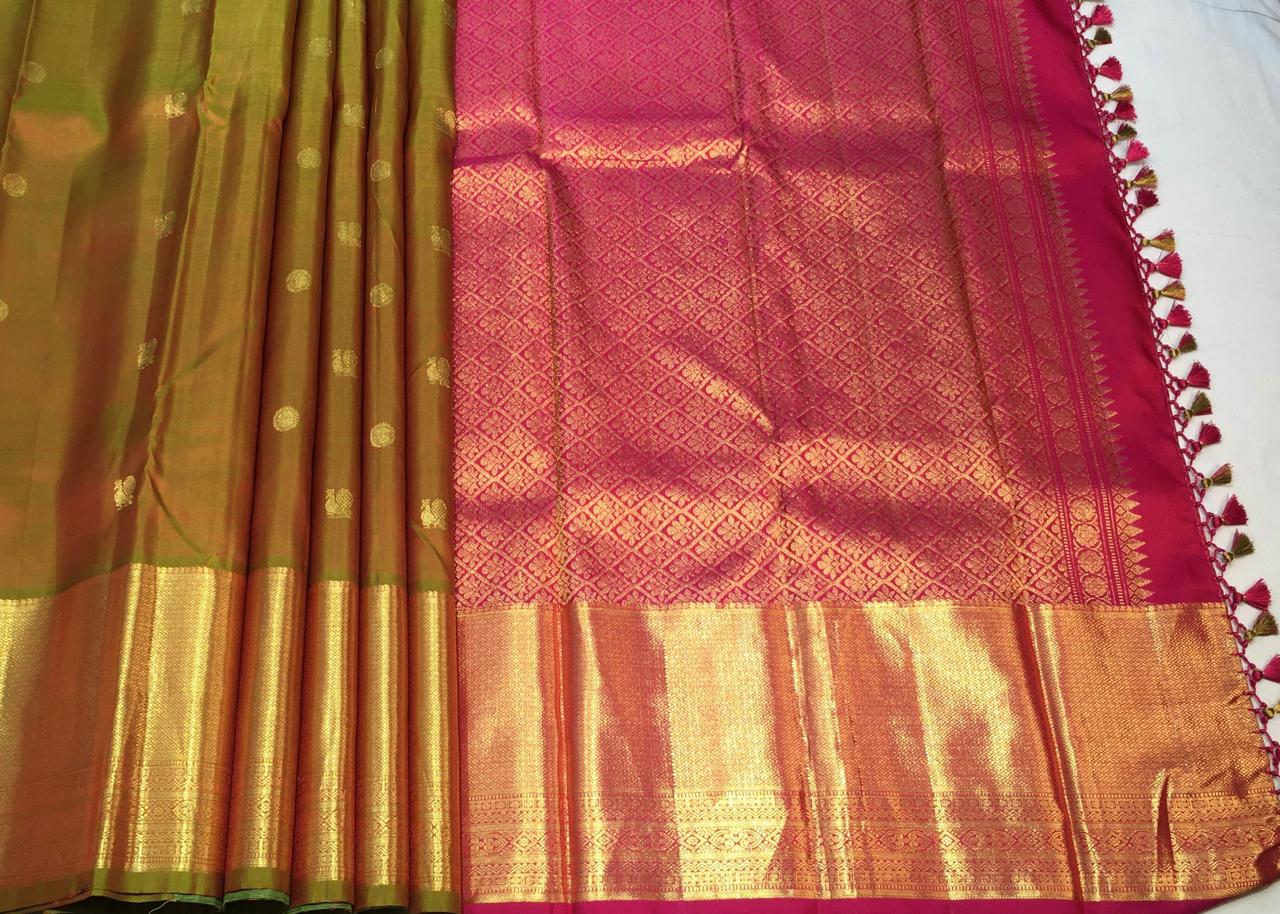 Dual tone Mehendi green Kanjivaram Saree With contrast pink pallu