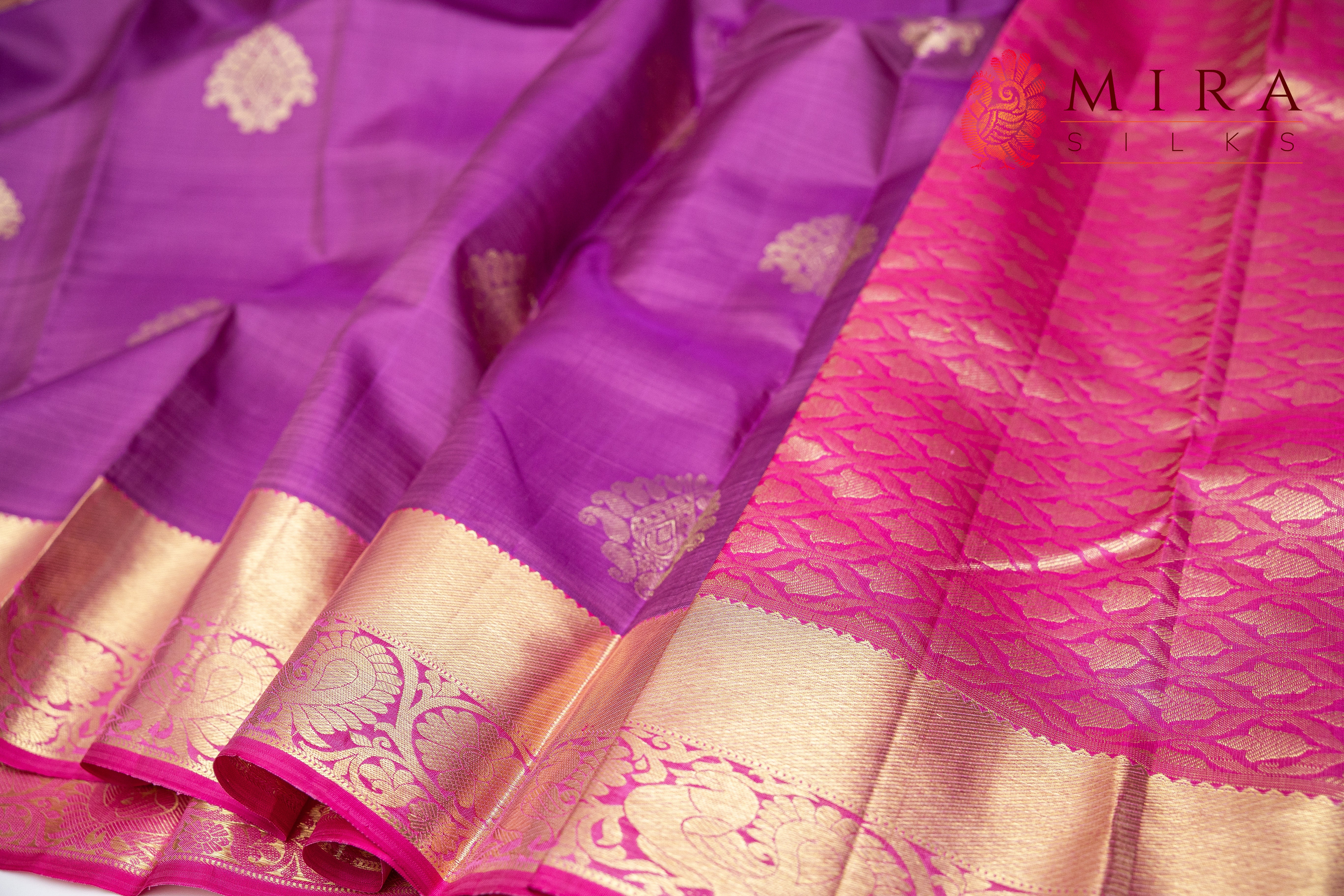 Dull Purple Kanjivaram saree with pink border