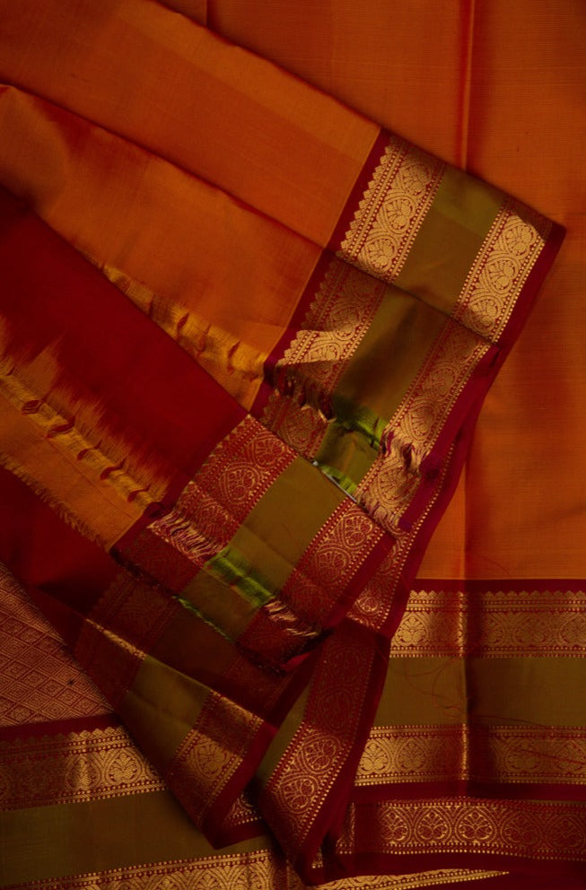 Turmeric Yellow Kanjivaram Saree with Olive Green & Maroon Border