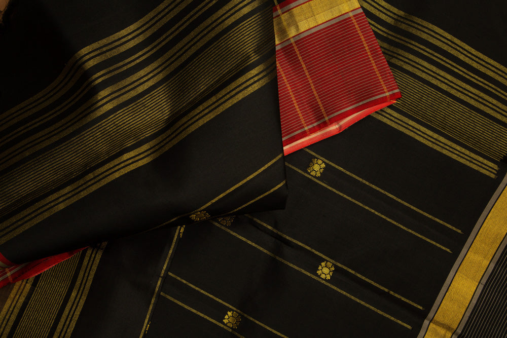 Beige Kanjivaram Saree with Orange & Black Border