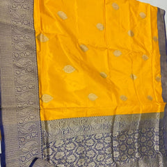 Turmeric Yellow Katan Silk Saree With Dark Blue Border